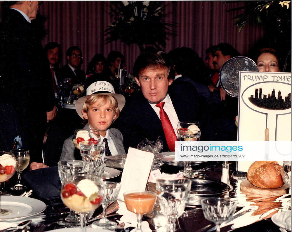 FILE PICTURE: DONALD J. TRUMP with his son DONALD JR. at Barry Weisselberg s Bar Mitzvah at the Rockwood Park Jewish Center in Queens in the summer of 1980. Barry is the son of Allen Weisselberg who was indicted and surrendered to authorities on July 1, 2021. New York USA - ZUMAct2_ 20210701_zaf_ct2_002