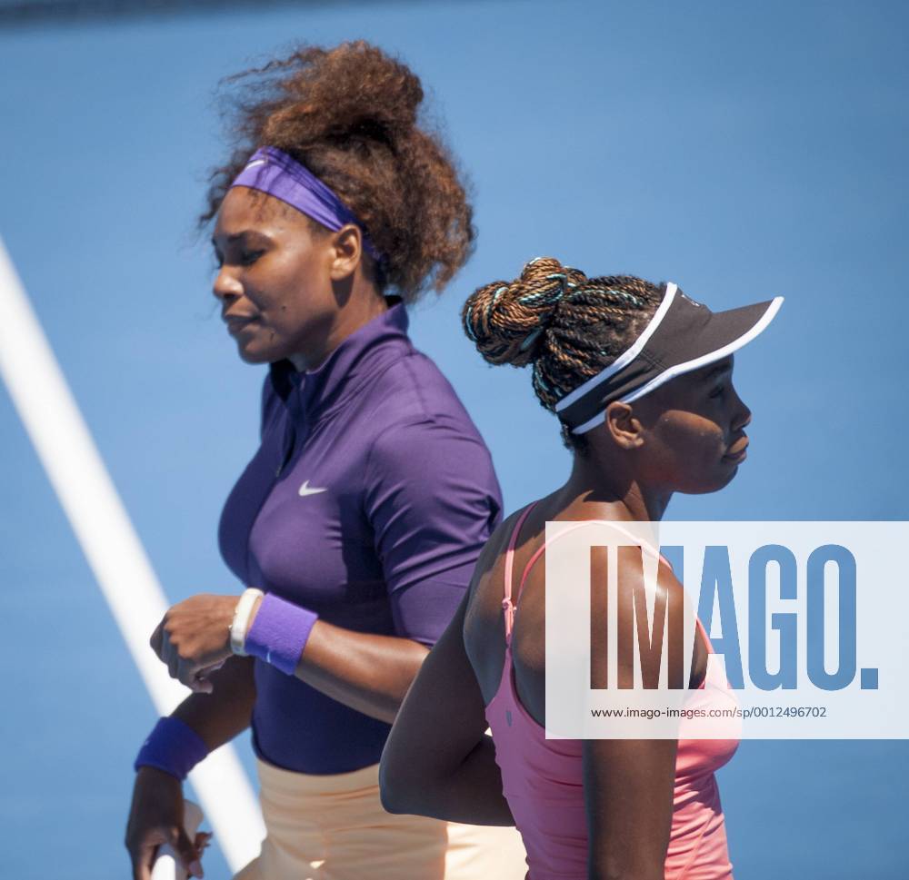 Jan. 22, 2013 - Venus Williams (USA) (pink shirt) and sister Serena Williams (USA) (purple shirt) have been upset in 2013 Womens Doubles play at Margaret Court Arena in Melbourne. Williams Sisters Upset in Australian Open - ZUMAkh1