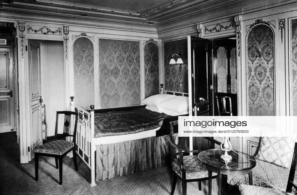 RMS Titanic was a British passenger liner that sank in the North Atlantic Ocean in the early morning of 15 April 1912, after colliding with an iceberg during her maiden voyage from Southampton to New York City.<br ><br > Of the 2,224 passengers and crew aboard, more than 1,500 died in the sinking, making it one of the deadliest commercial peacetime maritime disasters in modern history. The largest ship afloat at the time it entered service, the RMS Titanic was the second of three Olympic class ocean liners operated by the White Star Line, and was built by the Harland and Wolff shipyard in Belfast. UK: RMS Titanic, A Luxury Bedroom, c. 1912 xSupplier:MediaxCo.xLtd.x