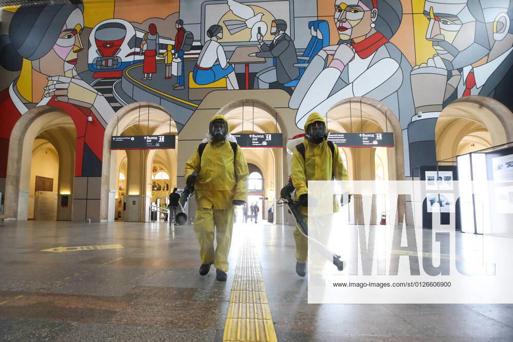 Employees of the Leader Center for High Risk Rescue Operations of the Russian Emergencies Ministry carry out disinfection of Leningradsky Railway Station amid the COVID-19 pandemic. Sergei Karpukhin TASS TS108D56