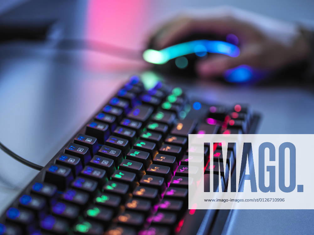 IMAGO Creative, Lifestyle, Gaming Gaming keyboard with illuminated keypad on table model released Symbolfoto property released ABRF00898