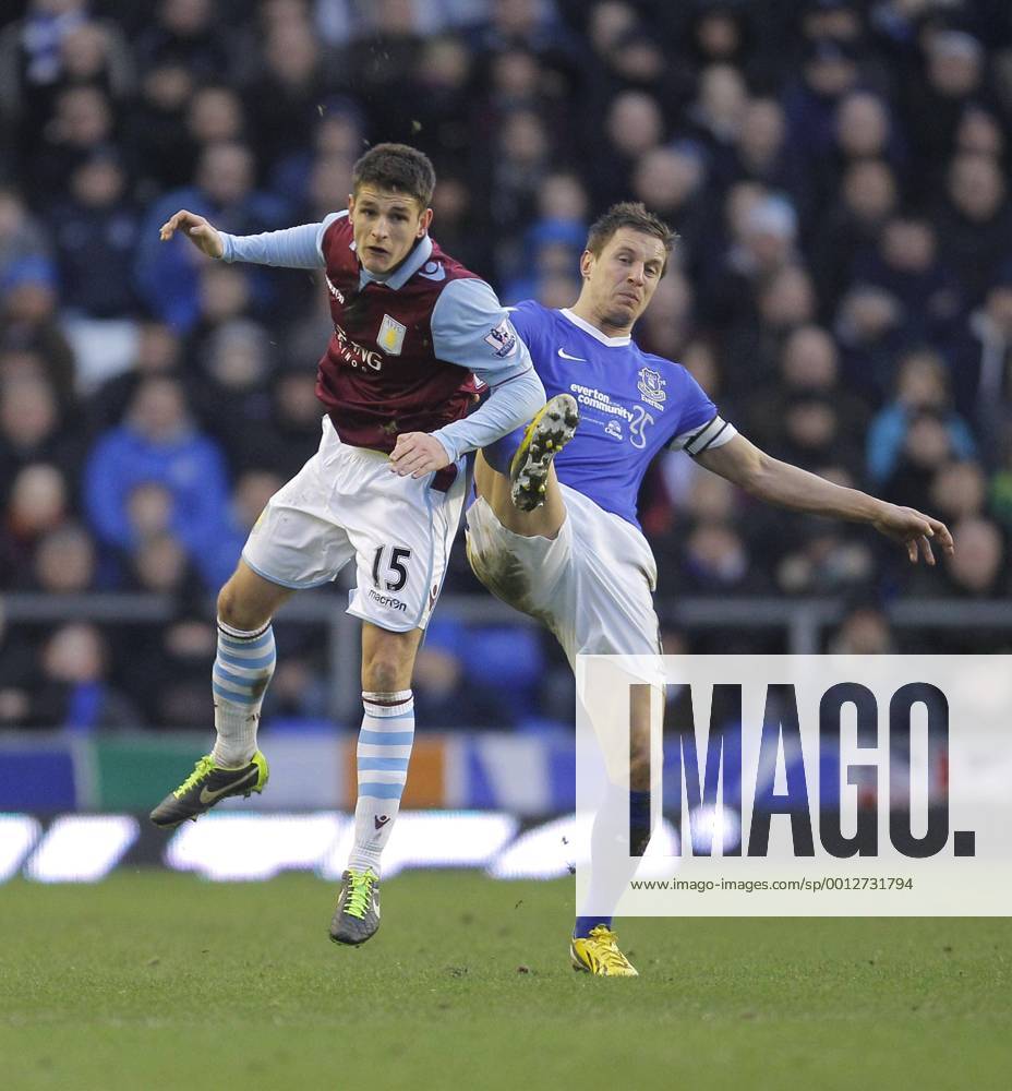 Ashley Westwood of Aston Villa (left) competes with Phil Jagielka of Everton- Football - Everton FC vs Aston Villa - Barclays Premiership - Goodison Park - Liverpool - Season 12 13 - 02 2 13. .