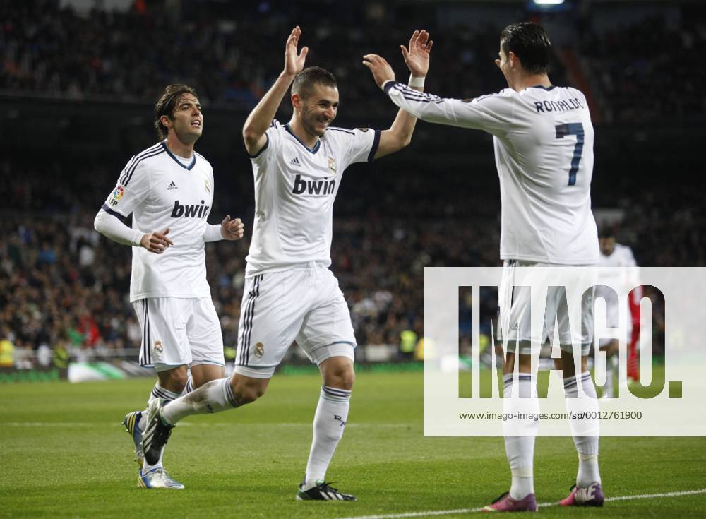 Madrid 09 02 2013. Football match between Real Madrid FC and FC Sevilla corresponding to the 23th day of the Spanish League, held at the Santiago Bernabeu stadium, in Madrid 02 09 2013. Karim Benzema score and celebrate with Kaka and Cristiano Ronaldo
