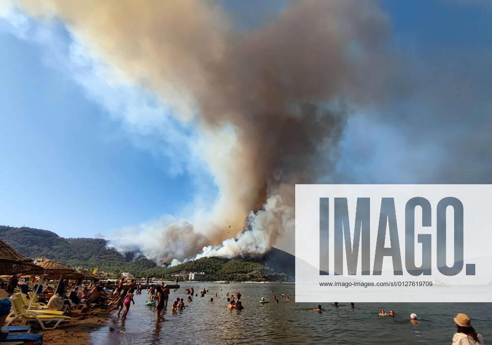 Smoke billows from a wildfire near Icmeler, 8km southwest of the Aegean Sea resort city of Marmaris. Wildfires have hit southern Turkey, sparked with temperatures exceeding 40°Ñ 104°F and strong winds, the country s tourist areas affected, several hotels evacuated. Arsen Khasanov TASS TS10A6D8