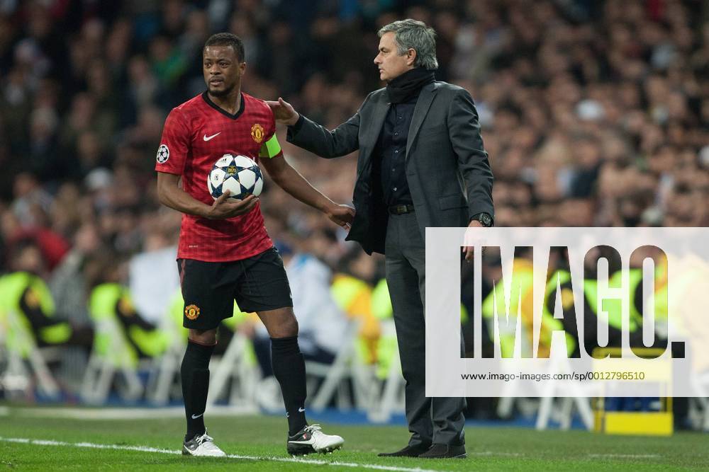 Football - 2012 2013 Champions League - Round of 16, First Leg: Real Madrid vs. Manchester United Patrice Evra of Manchester United and Jose Mourinho, manager of Real Madrid at the Santiago Bernabeu