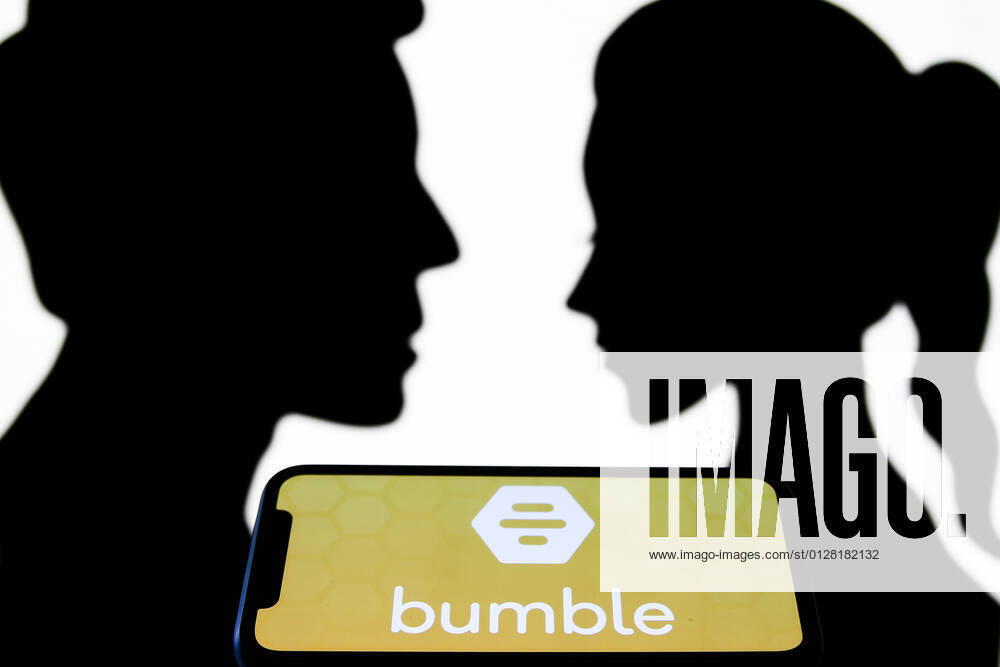 Dating Apps Photo Illustrations Bumble logo displayed on a phone screen is seen with paper silhouettes looking like a man and a woman in this illustration photo taken in Krakow, Poland on July 31, 2021. Krakow Poland porzycki-datingap210731_npmC9