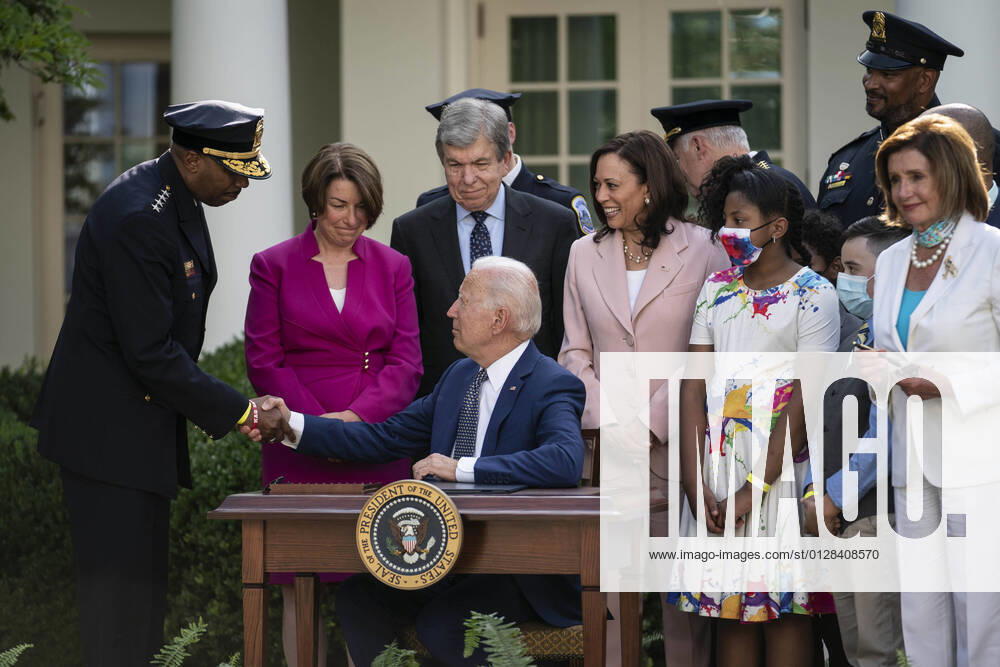 President Joe Biden shakes hands with Robert J. Contee III, Chief of the DC Metropolitan Police Department, after signing H.R. 3325 into law in the Rose Garden of the White House in Washington, DC, on Thursday, August 5, 2021. The Act will award four congressional gold medals to the United States Capitol Police and those who protected the U.S. Capitol on January 6. WAP202108055101 SARAHxSILBIGER