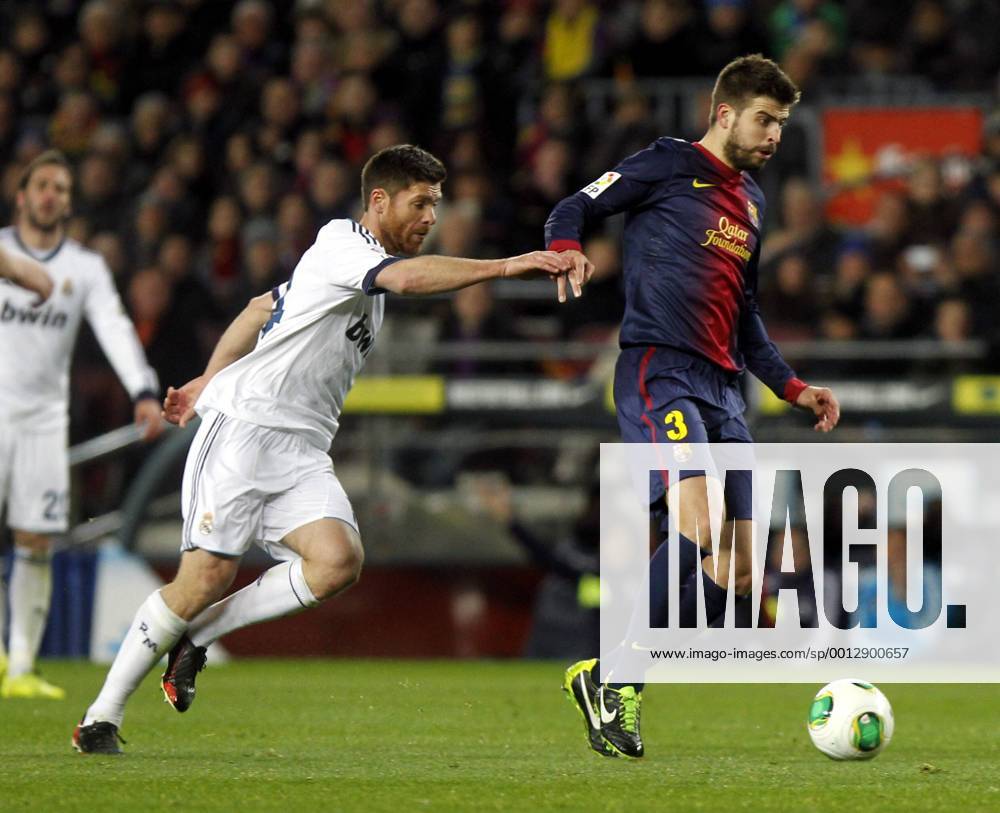 Copa del Rey. FC Barcelona vs Real Madrid. Gerard Pique and Xabi Alonso.