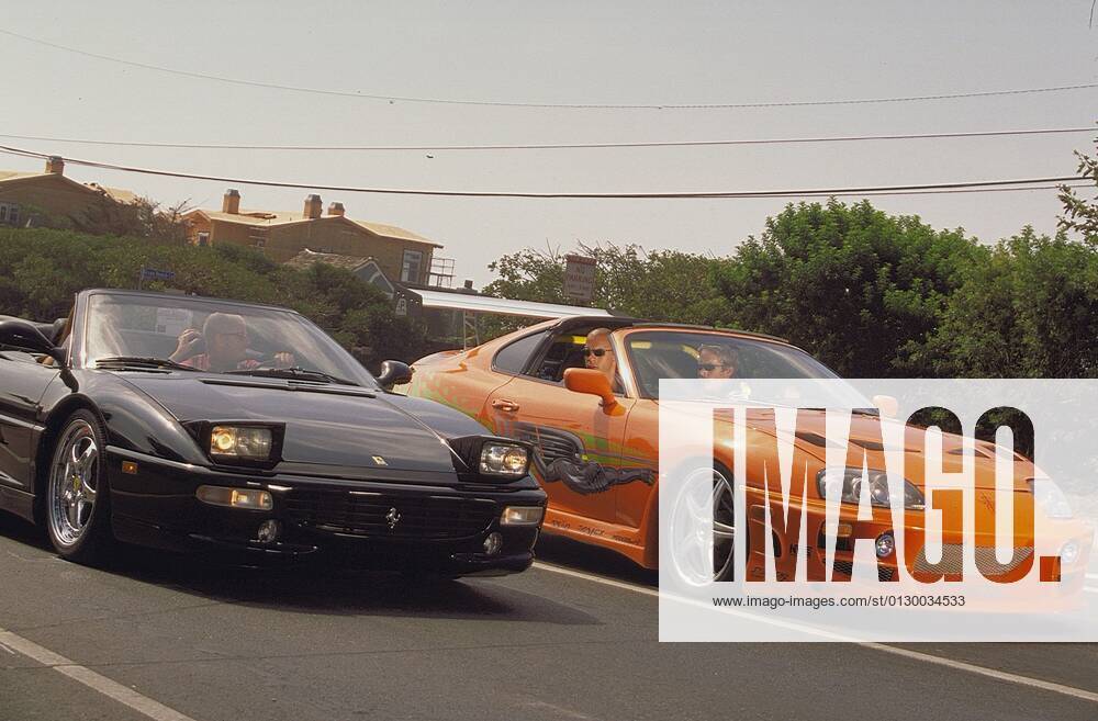 THE FAST AND THE FURIOUS, in orange car from left: Vin Diesel, Paul Walker, 2001. ? Universal courtesy Everett Collection Ref:MCDFAAN UV053 PUBLICATIONXNOTxINxCANxCHNxFRAxITAxJPNxNORxPOLxRUSxESPxUKxUSA