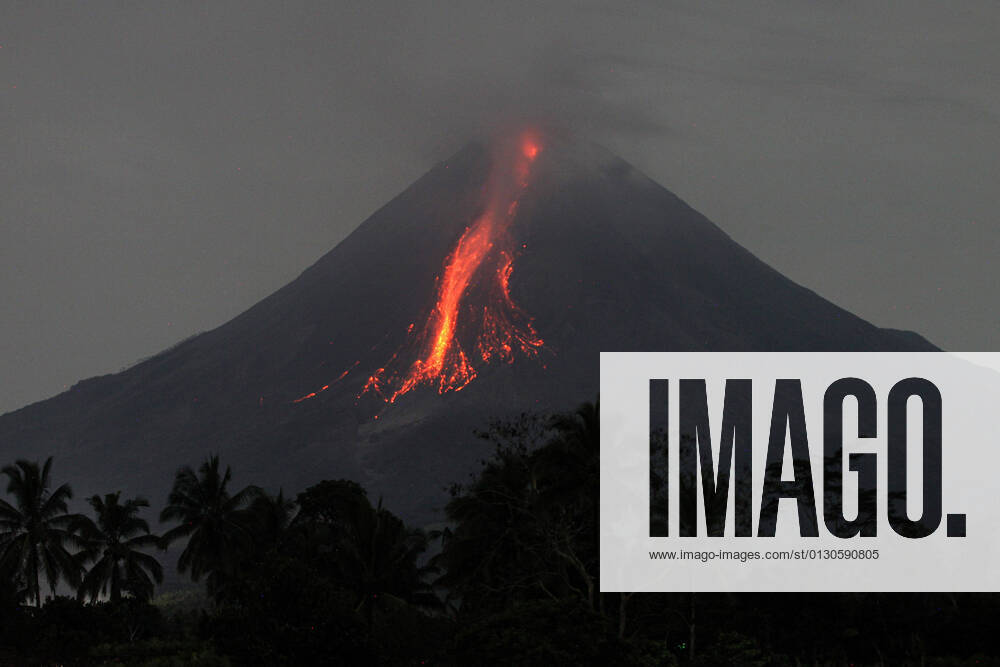 (210820) -- MAGELANG, Aug. 20, 2021 -- Photo taken on Aug. 20, 2021 shows volcanic materials spewing from Mount Merapi, seen from Srumbung village in Magelang, Central Java, Indonesia. (Photo by Xinhua) INDONESIA-MOUNT MERAPI-ERUPTION PriyoxUtomo
