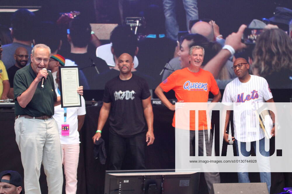 Queens, New York, USA: Mayor of New York City, Bill de Blasio, Senate Leader, Chuck Schumer with Run DMC band and EPMD during It s Time for Hip Hop in New York Concerts presented by The City of New York, Universal Hip Hop Museum, and IDEKO as part of NYC Homecoming Week held at Forest Hill stadium in Queens, New York. The event starts at 4pm till 9.30pm. There is tight security check up with proof of vaccination or COVID -19 test while most of the people arent using masks.