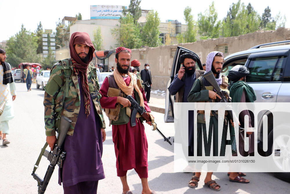 Taliban fighters patrol in the streets of a neighborhood in Kabul, Afghanistan, on Sunday, August. 22, 2021. AFG2021082204 BashirxDarwish
