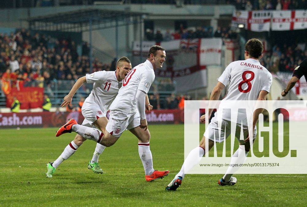 England s Wayne Rooney celebrates scoring his sides opening goal..Montenegro v England- World Cup Qualifier - Podgorica City Stadium, Podgorica- 26 03 13 - Picture David Klein Sportimage .