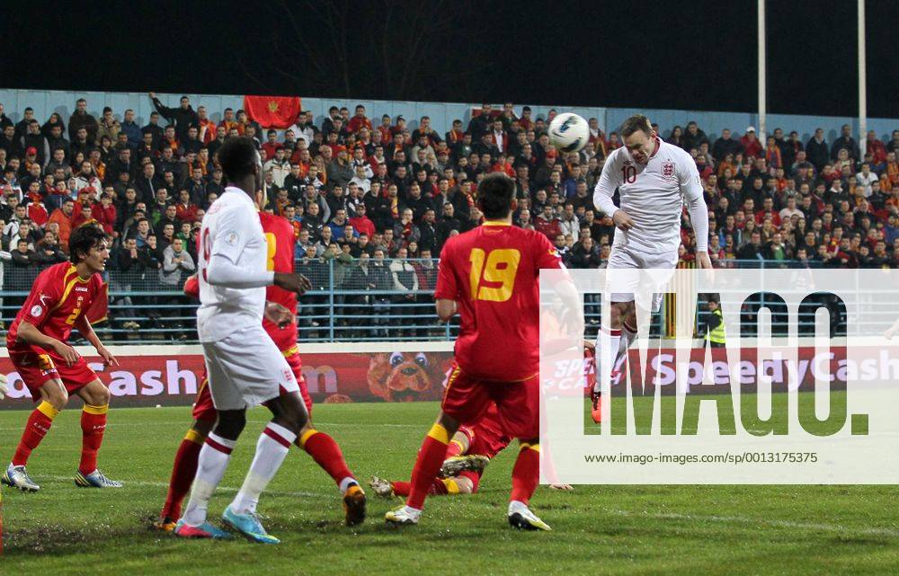 England s Wayne Rooney scoring his sides opening goal..Montenegro v England- World Cup Qualifier - Podgorica City Stadium, Podgorica- 26 03 13 - Picture David Klein Sportimage .