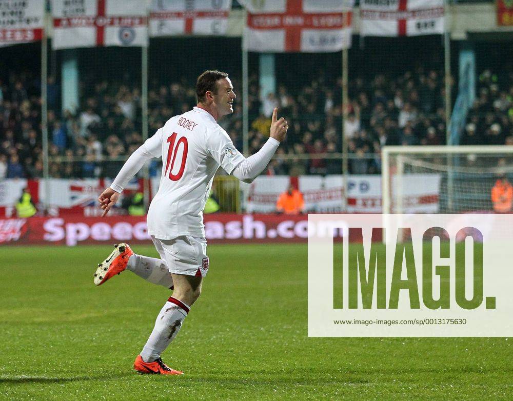 England s Wayne Rooney celebrates scoring his sides opening goal..Montenegro v England- World Cup Qualifier - Podgorica City Stadium, Podgorica- 26 03 13 - Picture David Klein Sportimage .