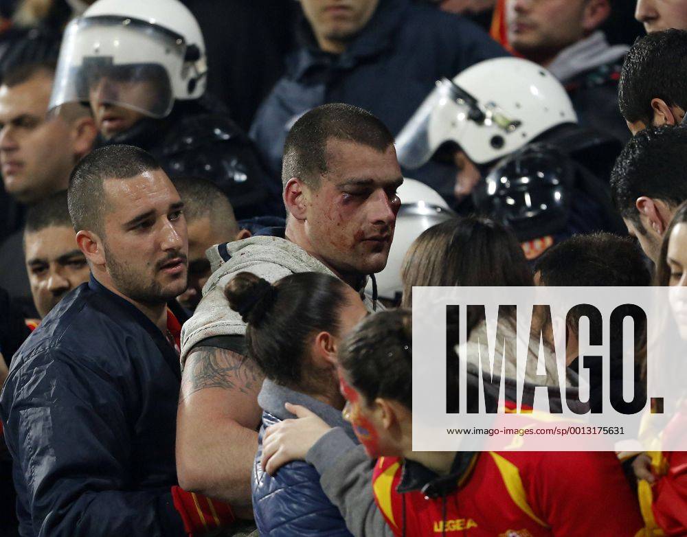 Montenegro s fans fight amongst themselves before kick-off - World Cup Qualifier - Podgorica City Stadium, Podgorica- 26 03 13 - DavidxKlein Sportimage .