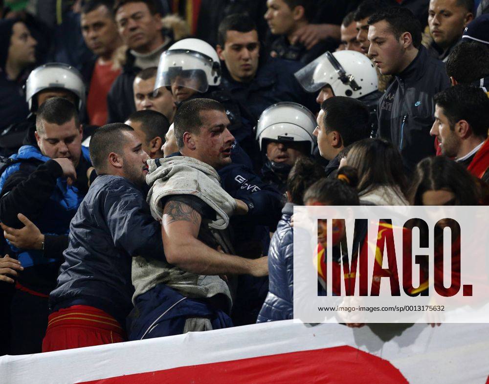 Montenegro s fans fight amongst themselves before kick-off..Montenegro - World Cup Qualifier - Podgorica City Stadium, Podgorica- 26 03 13 - DavidxKlein Sportimage .