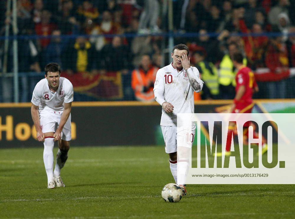 England s Wayne Rooney looks on dejected after Montenegro s goal..Montenegro v England- World Cup Qualifier - Podgorica City Stadium, Podgorica- 26 03 13 - Picture David Klein Sportimage .