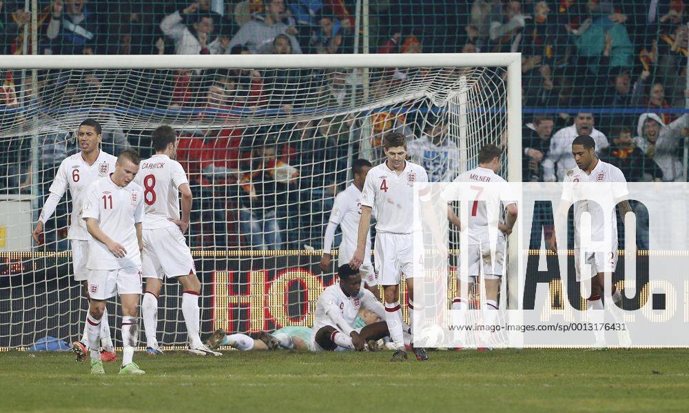 England s Steven Gerrard looks on dejected after going 1-1..Montenegro v England- World Cup Qualifier - Podgorica City Stadium, Podgorica- 26 03 13 - Picture David Klein Sportimage .