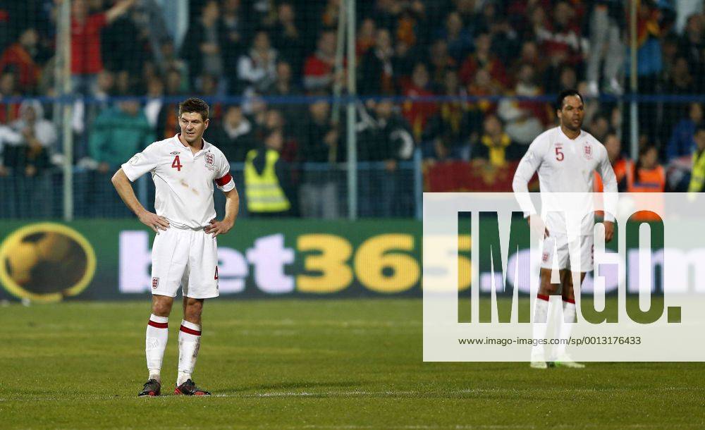 England s Steven Gerrard looks on dejected after going 1-1..Montenegro v England- World Cup Qualifier - Podgorica City Stadium, Podgorica- 26 03 13 - Picture David Klein Sportimage .