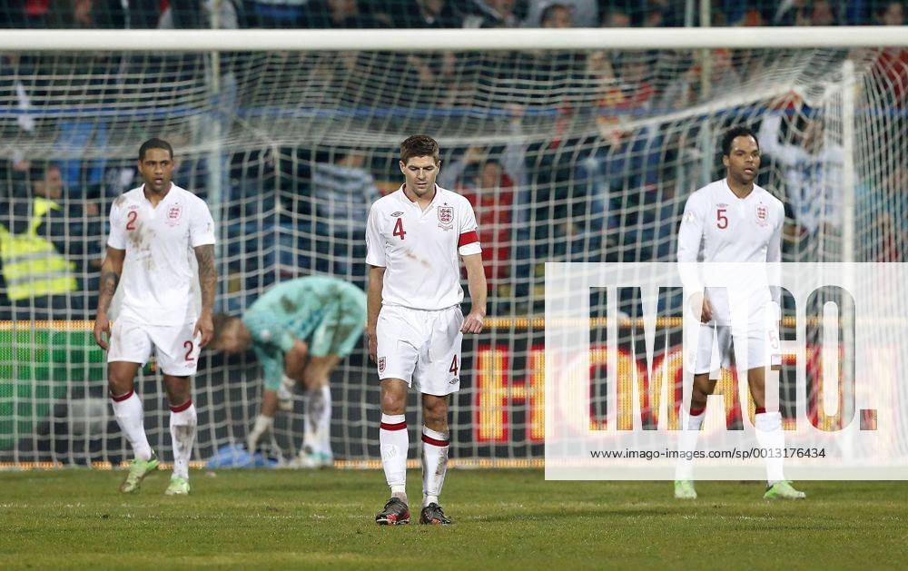 England s Steven Gerrard looks on dejected after going 1-1..Montenegro v England- World Cup Qualifier - Podgorica City Stadium, Podgorica- 26 03 13 - Picture David Klein Sportimage .