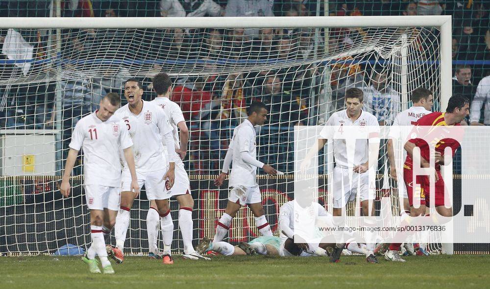 England s Steven Gerrard looks on dejected after going 1-1..Montenegro v England- World Cup Qualifier - Podgorica City Stadium, Podgorica- 26 03 13 - Picture David Klein Sportimage .