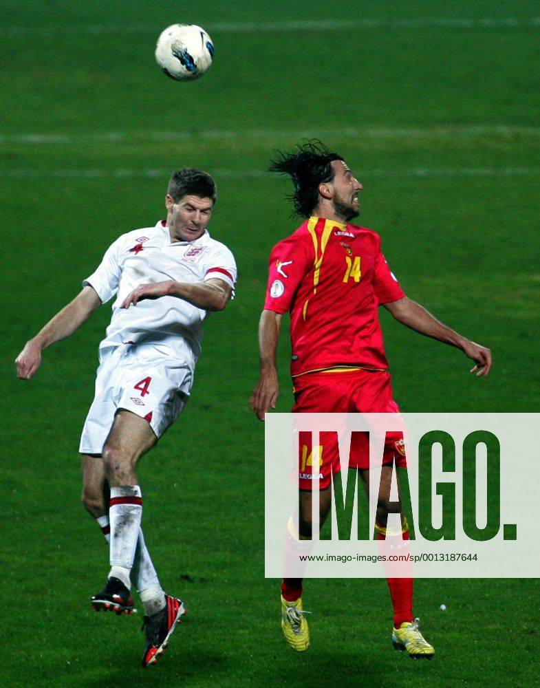 Podgorica(Montenegro) Montenegro-England FIFA world cup Brazil qualifiers men football Steven Gerrard(L) England and Dejan Damjanovic(r) Montenegro :