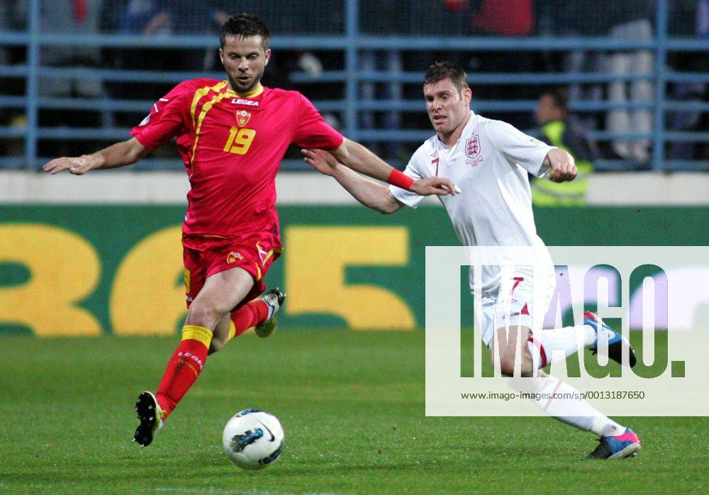 Podgorica(Montenegro) Montenegro-England FIFA world cup Brazil qualifiers men football James Milner(r) England and Vladimir Bozovic(L) Montenegro :