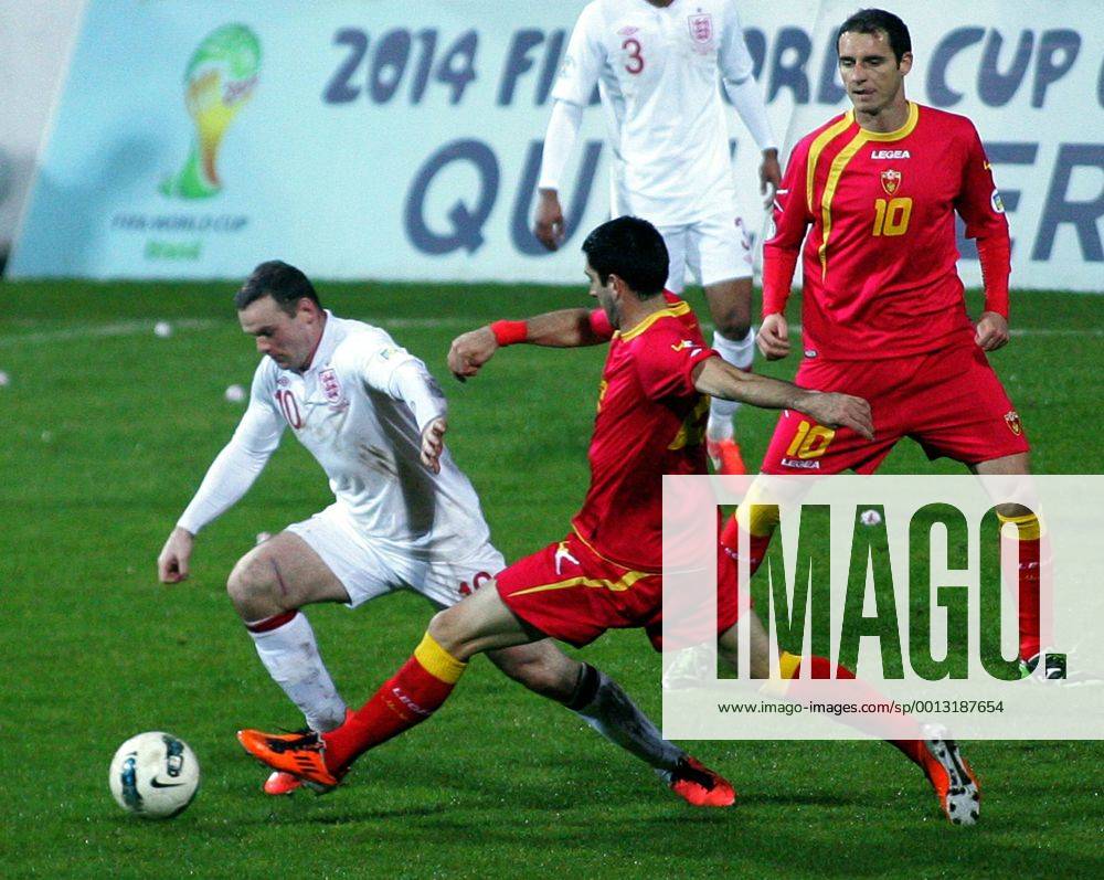 Podgorica(Montenegro) Montenegro-England FIFA world cup Brazil qualifiers men football Wayne Rooney(L) England and Andrija Delibasic(R) Montenegro :