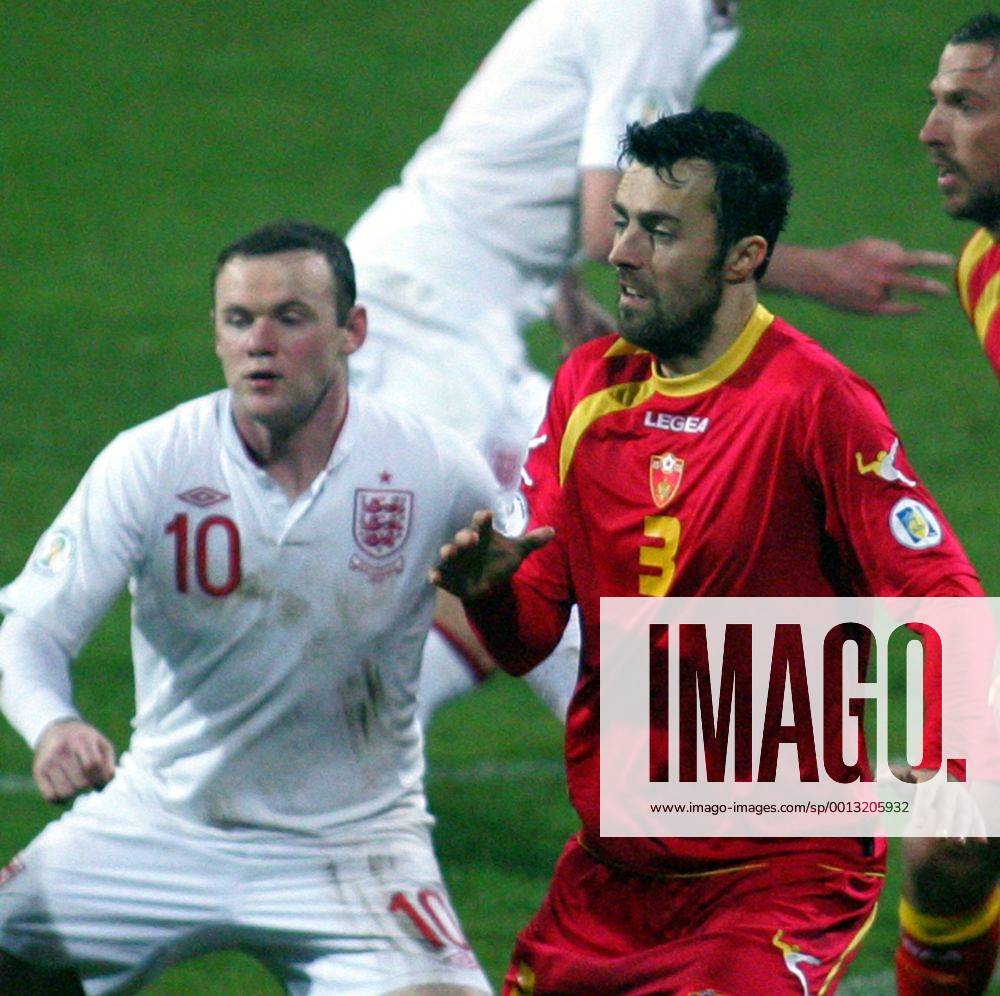 Podgorica(Montenegro) Montenegro-England FIFA world cup Brazil qualifiers men football Wayne Rooney(L) England and Marko Basa(r) Montenegro :
