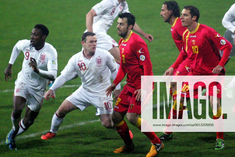 Podgorica(Montenegro) Montenegro-England FIFA world cup Brazil qualifiers men football Danny Welbeck(L) with Wayne Rooney(2L) England and Marko Basa(3L) with Andrija Delibasic(r) Montenegro :