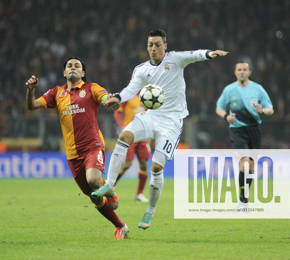 UEFA Champions League Quarter Final second leg match between Galatasaray and Real Madrid at Turk Telekom Arena Stadium on April 9, 2013 in Istanbul, Turkey. Match Scored: Galatasaray 3 - Real Madrid 2 Pictured: Mesut Ozil (R) of Real Madrid and Selcuk Inan of Galatasaray.