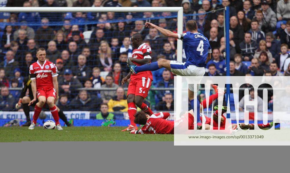 Evertons s Darren Gibson s shot hits QPR Defender Clint Hill nad ends up in the back of the net- Barclays Premier League - FC Everton vs Queens Park Rangers QPR - Goodison Park -Liverpool- 13th April 2013 - .