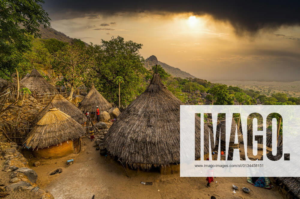 Sunset over traditional huts of the Otuho (Lotuko) tribe, Imatong mountains, Eastern Equatoria, South Sudan, Africa