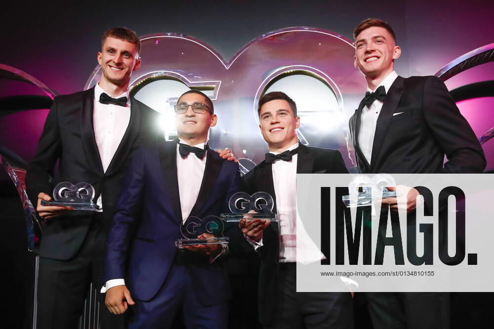 MOSCOW, RUSSIA – SEPTEMBER 16, 2021: Olympic champions Vladislav Larin, Albert Batyrgaziyev, Nikita Nagorny, and Maxim Khramtsov (L-R) with the Men of the Year trophy at the 2021 GQ Men of the Year Awards ceremony, at the Mossovet Theatre. Artyom Geodakyan TASS TS110BB6