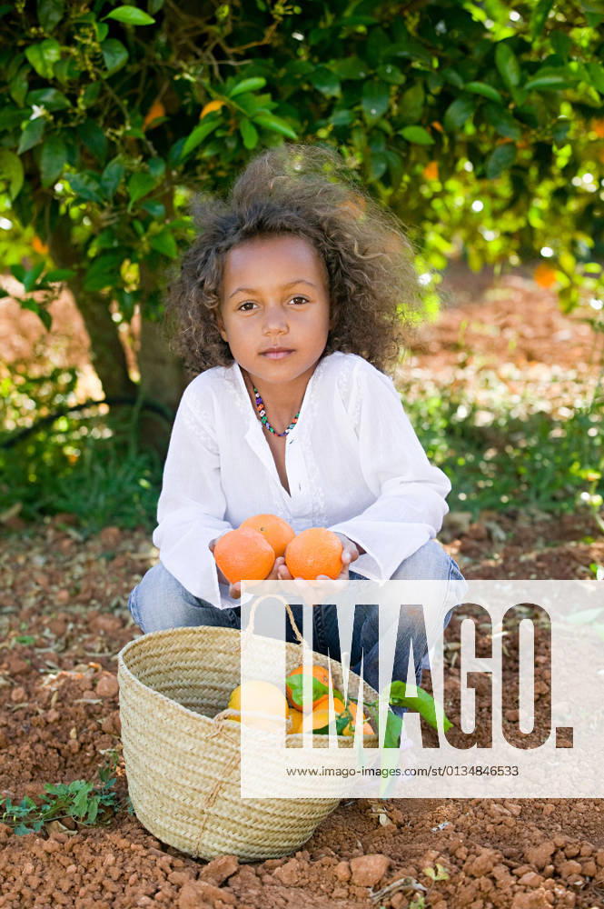 Girl with basket of oranges, 11.11.2010,