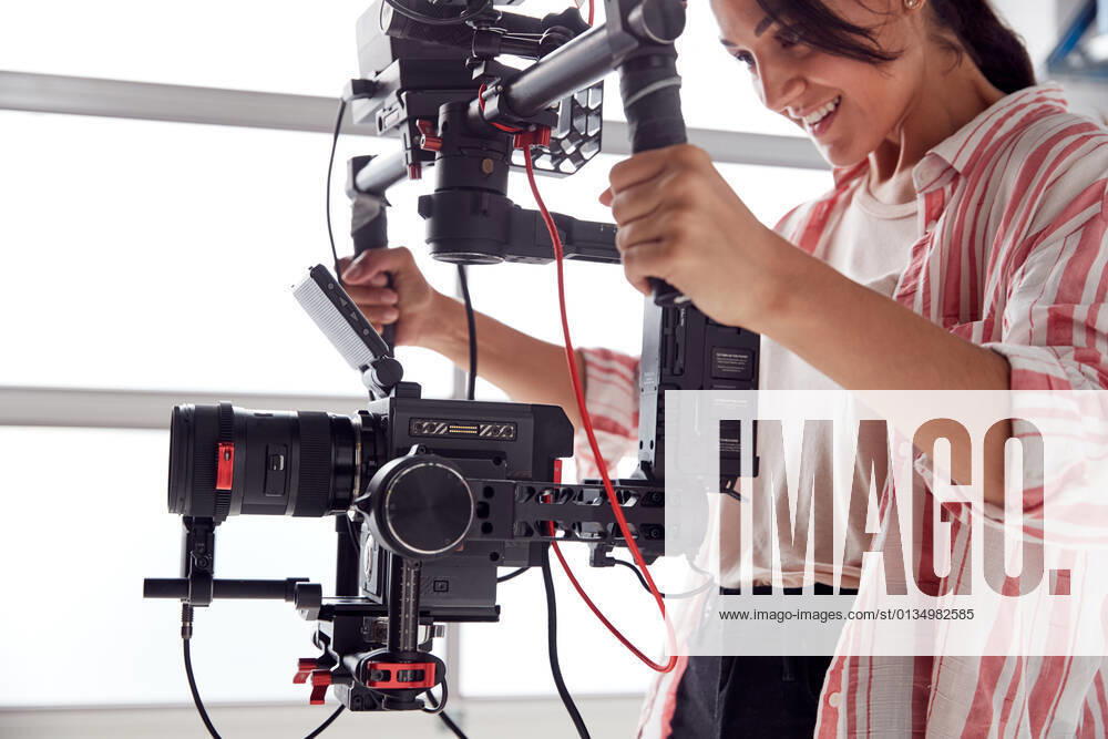 Digital camera,filming,digital cameras mmq-yof ,model released, Symbolfoto