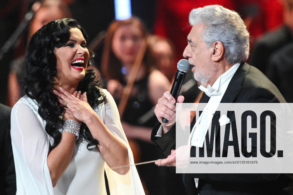 Russia Opera Singer Netrebko Anniversary 6653956 18.09.2021 Opera singers Anna Netrebko reacts as Placido Domingo speaks during a concert marking Anna Netrebko s 50th birthday, at the State Kremlin Palace, Moscow, Russia. Ramil Sitdikov Sputnik Moscow Russia