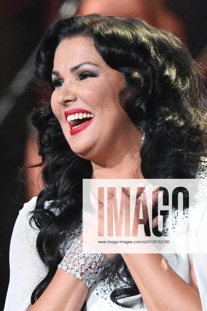 Russia Opera Singer Netrebko Anniversary 6653969 18.09.2021 Opera singer Anna Netrebko reacts during a concert marking her 50th birthday, at the State Kremlin Palace, Moscow, Russia. Ramil Sitdikov Sputnik Moscow Russia