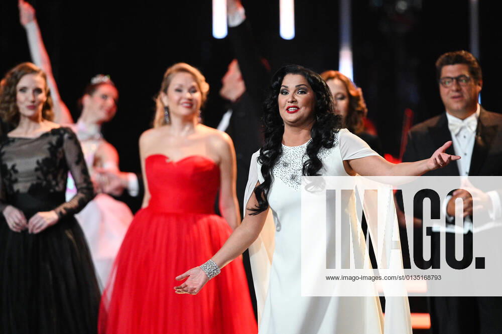 Russia Opera Singer Netrebko Anniversary 6654005 18.09.2021 Opera singer Anna Netrebko, at the foreground, reacts during a concert marking her 50th birthday, at the State Kremlin Palace, Moscow, Russia. Ramil Sitdikov Sputnik Moscow Russia