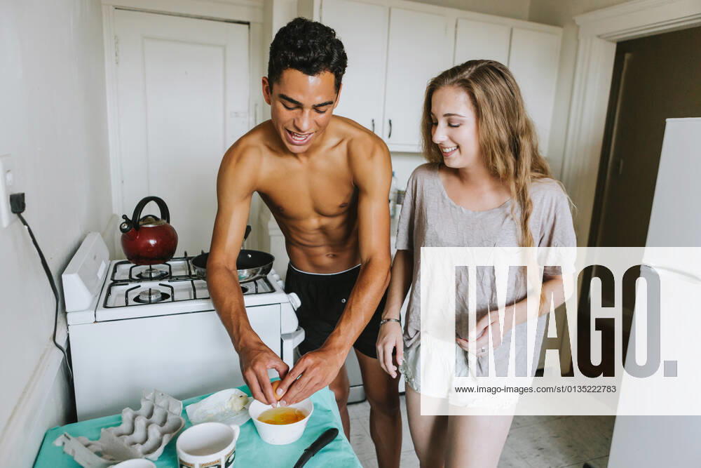 Couple in kitchen cooking breakfast, 13.09.2016,