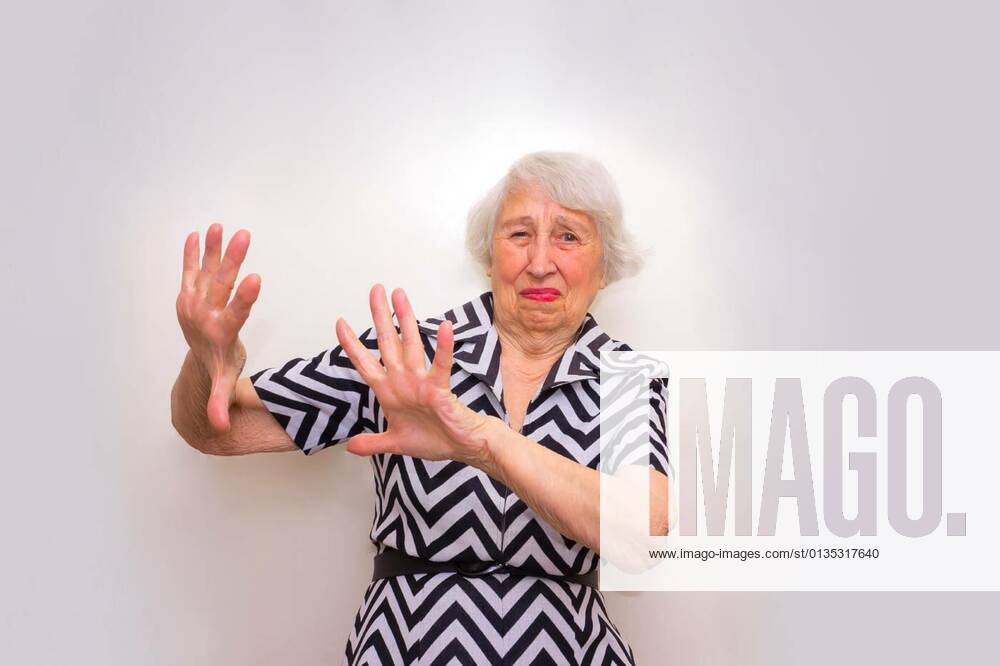 Offended old senior woman rejecting offer with her hands model released, Symbolfoto, 12.10.2020,