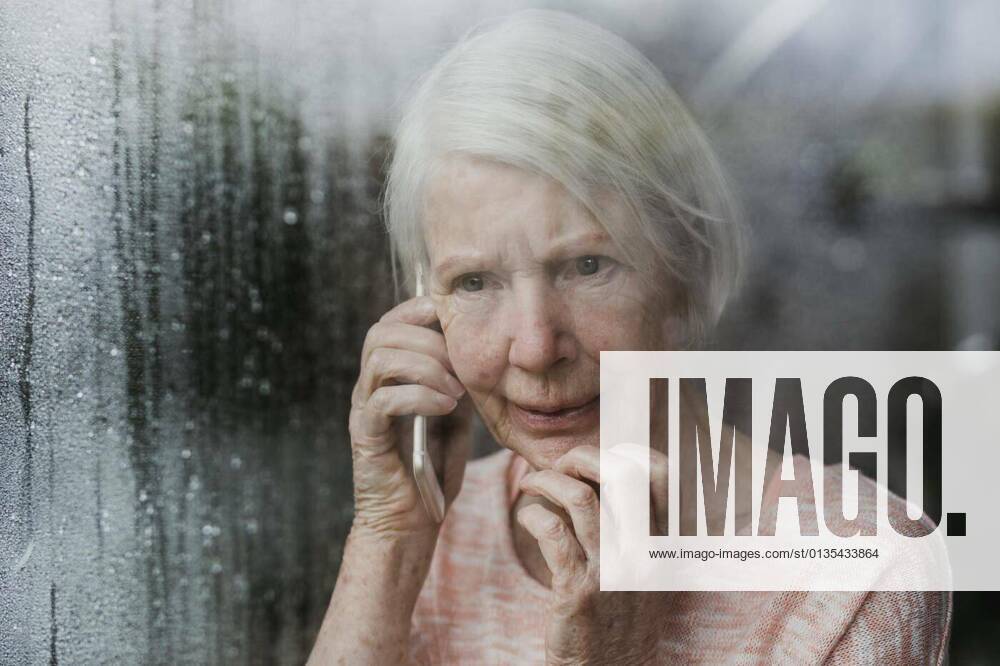 Senior Woman Reporting A Neighborhod Crime model released, Symbolfotoproperty released, , 12.10.2020,