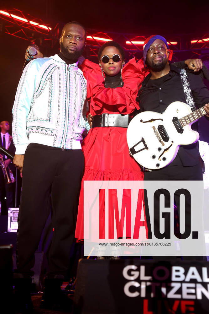 NEW YORK, NY- SEPTEMBER 22: Pras Michel, Lauryn Hill and Wyclef Jean pictured during the Fugees The Score 25th Anniversary Tour Surprise Performance at Pier 17 in New York City on September 22, 2021.