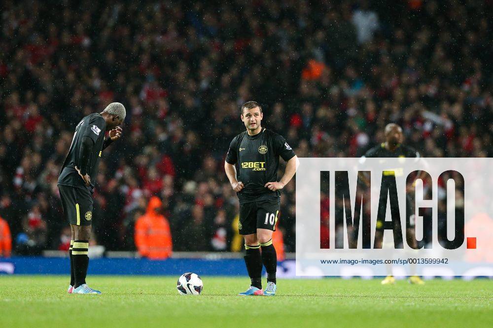 Football - 2012 2013 Premier League - Arsenal vs Wigan Wigan s Arouna Kone and Wigan s Shaun Maloney look dejected at the Emirates Stadium, London