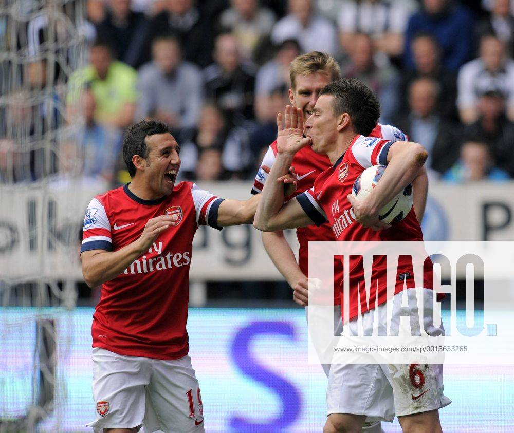 Laurent Koscielny (L) of Arsenal celebrates scoring their first goal - Barclays Premier League - Newcastle United - Arsenal FC London. St. James Park - Newcastle - 19 05 2013 - PicxRichardxLee Sportimage .