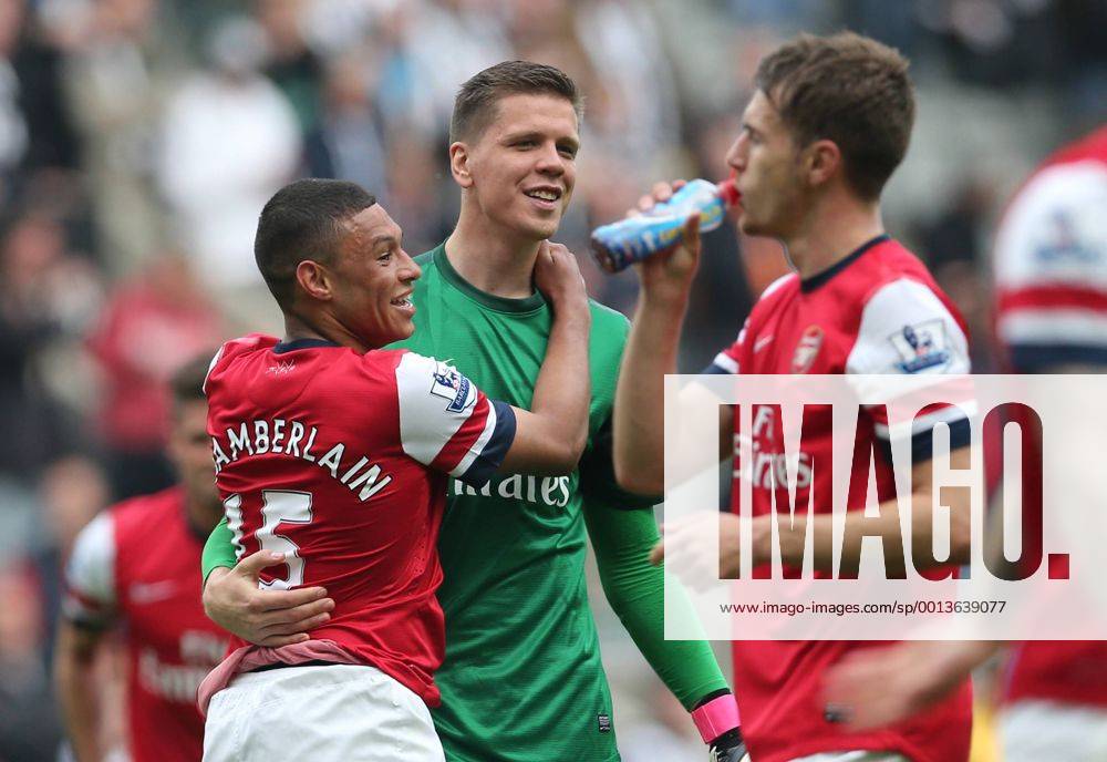 Alex Oxlade-Chamberlain, Wojciech Szczesny Football - English Premiership - Newcastle United v Arsenal FC Arsesnal player celebrates securing Champions League football during the Newcastle United v Arsenal FC , Barclay s Premier League football match at St James Park, Newcastle. Colorsport 19th May 2013