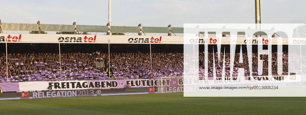 Fußball, Stadiongeschichte VfL Osnabrück 24.05.2013, Osnatel-Arena, Osnabrück, Relegation Hinspiel, VfL Osnabrück, im Bild Die ausverkaufte Osnabrücker Fankurve mit dem Banner GER, Relegation
