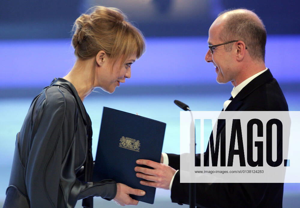 Heike Makatsch, German actress, left, and Ulrich Muehe, German actor, right, during the Bavarian Film Awards ceremony in Munich, Bavaria