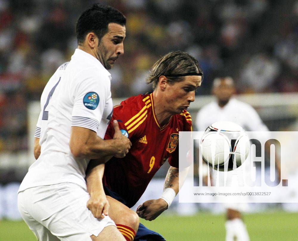 Quarter finals match of Euro 2012 football championships between Spain and France at Donbass Arena. In this picture, Adil Rami and France Torres. ANTONIOxSANZx